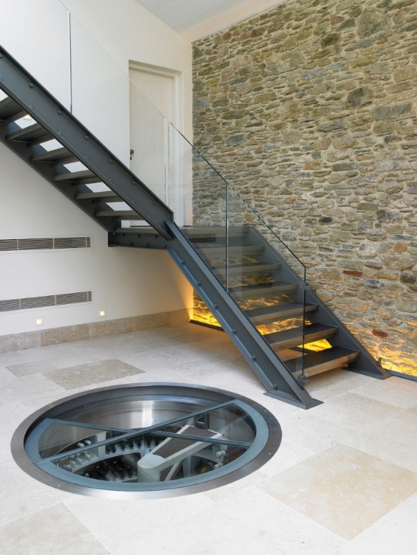 A staircase leading to a spiral cellar